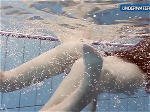amateur Lastova continues her swim