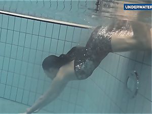 showcasing bright milk cans underwater makes everyone crazy