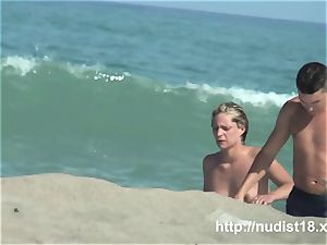 nude beach spycam shoots a scorching honey with a hidden web cam